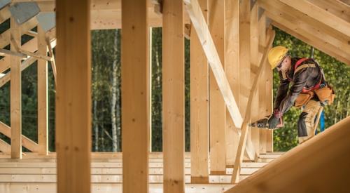 Wooden frame house under construction